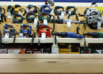 Obraz premium Shop for selling electric tools. Drills, screwdrivers, electric saws, grinder. Defocused, blurred image.