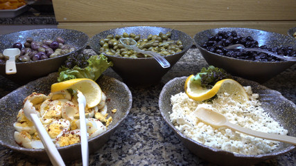 Appetizing snacks for breakfast in the buffet restaurant.