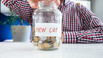 Conceptual image of taking bank loan for purchasing new car