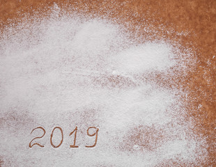 Figures 2019 are written in the snow.