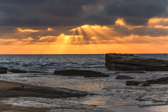 Sun rays bursting through - Sunrise Seascape