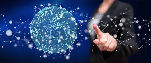 Woman touching a global connection concept