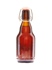 Small Brown Beer Bottle with cork on a white background with Copy space