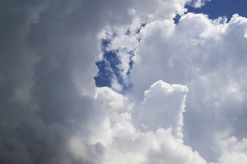 beautiful ominous clouds on blue sky background