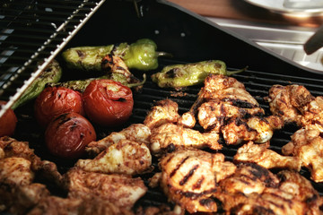 close up chicken meat on barbecue
