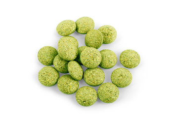 herbal green pill on white background