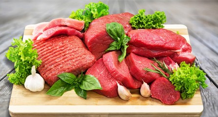 Fresh Raw Meat Background with vegetables