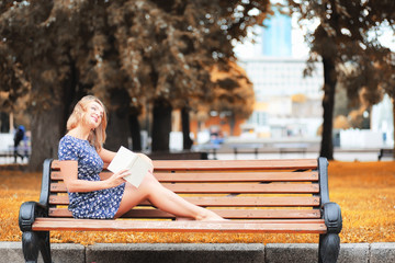 Beautiful girl in the autumn park