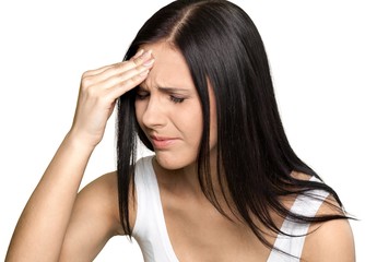 young woman suffering from a headache
