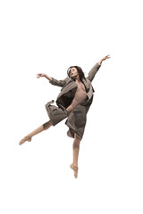Obraz premium Beautiful slim young female modern jazz contemporary style ballet dancer in silhouette wearing beige long cloak isolated on a white studio background