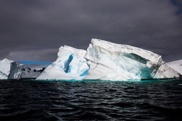 ice in the Antarctica with iceberg in the ocean