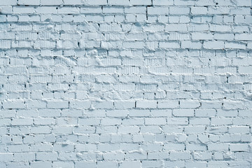 the texture of the brick wall painted in blue, light color