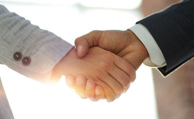 Business people shaking hands isolated on white background