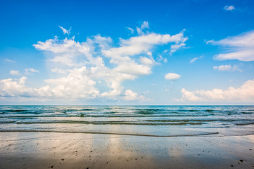 Sand beach and blue sky background