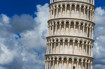 The famous Leaning Tower of Pisa among beautiful clouds