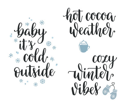Winter seasonal inspirational lettering set. Baby its cold outside, Hot cocoa weather, Cozy winter vibes hand written calligraphy