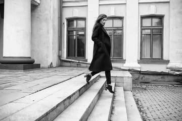 Girl in a coat black and white photo