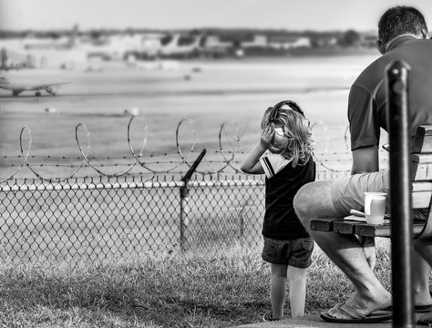 Child Watches Airplanes Black and White