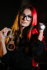 Police. Uniform. Sexy woman. woman is a policeman. Black background