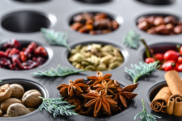 Fototapeta na wymiar Traditional winter spice for baking. Christmas spices - cinnamon, anise, nutmeg.