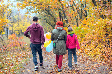 Joyful family - mom, teenage daughter and son