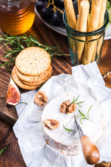 Serving camembert cheese, festive Christmas food
