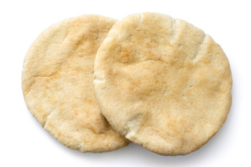 Two plain pita breads isolated on white from above.