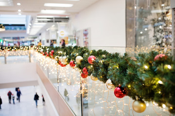An interior of decorated shopping center at Christmas time.