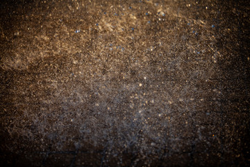 Splashes of water and bokeh of Water on a Sunset Background.