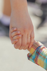 Mom's hand and daughter's hand