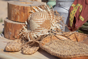 Fototapeta na wymiar Old Russian wooden utensils made of straw and wood