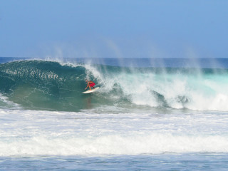 Surfer in the Pipeline of Playa Zicatela in Puerto Escondido, Mexico