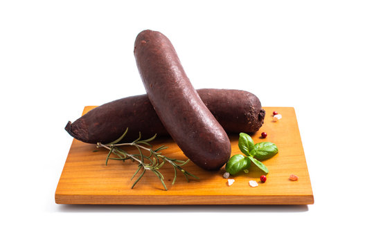 Food concept Raw Blood pudding black sausages on white backgroud