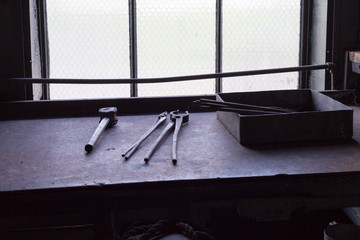 old vintage hand tools on wooden background