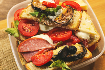 sandwiches in plastic portable box for food. fast food.