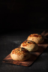 fresh pastry on black background
