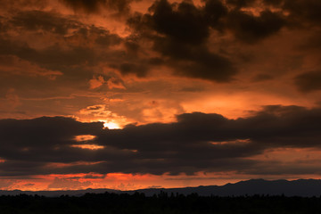 beautiful Golden sky with mountain before sunset
