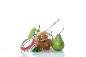 sweet fruit jam with apples and pears in a glass jar