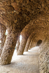 Long corridor of walls and columns in stones,  Barcelona, Spain