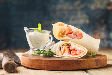 fresh tortilla wrap with salmon - obrazy, fototapety, plakaty