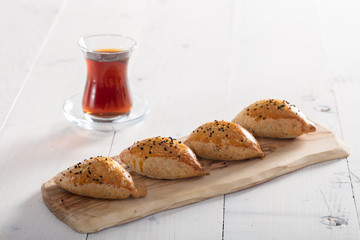 fresh pastry on white background with turkish tea