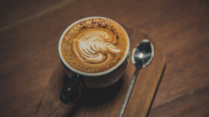 Hot Latte Coffee On Wooden Table