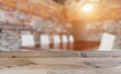 blank wooden table. Flooring. Brick wall. Open space office interior with like conference room. Mockup. 3D rendering.