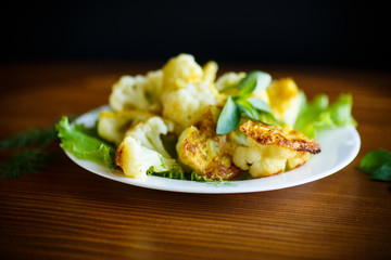 cauliflower fried in batter on a plate