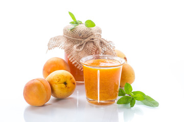 fresh sweet apricot jam on a wooden table