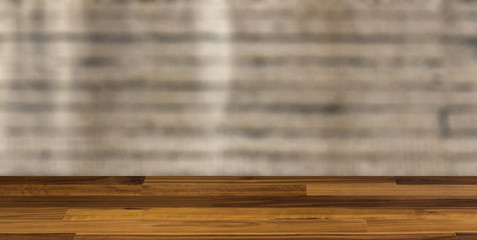 blank wooden table. Flooring. The wall of the old house. Cracks on the surface. Background