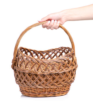 Basket in hand on white background isolation