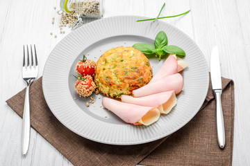 Frittata with tomatoes, red peppers, mustard and ham