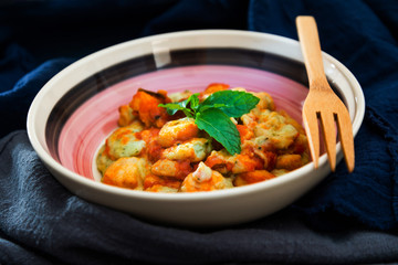 Dish made with cooked duck meat, dehydrated potato, fresh cream of mushroom and cheese