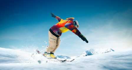 Fototapeta na wymiar Skiing. Jumping skier. Extreme winter sports.